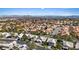 An aerial view captures this expansive community, showcasing its mature landscaping and stunning mountain backdrop at 1508 Sun Copper Dr, Las Vegas, NV 89117
