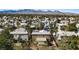 An elevated view highlights this vibrant community with mature trees, well-kept homes, and scenic mountain views at 1508 Sun Copper Dr, Las Vegas, NV 89117