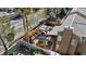 Overhead view of a secluded backyard featuring a covered patio, outdoor seating, and decorative landscaping at 1508 Sun Copper Dr, Las Vegas, NV 89117