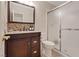 Bathroom featuring a glass-enclosed shower, single vanity, and tile accents at 1508 Sun Copper Dr, Las Vegas, NV 89117