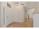 Bright foyer with tile flooring, chandelier, and neutral color palette at 1508 Sun Copper Dr, Las Vegas, NV 89117