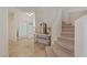 Beautiful staircase and tile floors in a bright foyer at 1508 Sun Copper Dr, Las Vegas, NV 89117