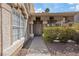 Inviting front entrance with stone accents and mature landscaping at 1508 Sun Copper Dr, Las Vegas, NV 89117