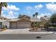 Charming home with a three-car garage and desert landscaping at 1508 Sun Copper Dr, Las Vegas, NV 89117