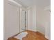 Upstairs hallway with hardwood floors and views to rooms and interior doors at 1508 Sun Copper Dr, Las Vegas, NV 89117