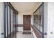 Welcoming front entry with decorative ironwork and a classic brown door at 1837 Alicant Way, Henderson, NV 89014