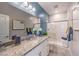 Elegant bathroom features granite countertops, a glass-enclosed shower, and contemporary fixtures at 1921 Lewis Bay Ave # Lot 21, North Las Vegas, NV 89084