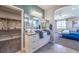 Bathroom with double vanity, granite countertops, and walk-in closet access at 1921 Lewis Bay Ave # Lot 21, North Las Vegas, NV 89084