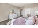 Bright bedroom features a plush bed, modern decor, and ample closet space at 1921 Lewis Bay Ave # Lot 21, North Las Vegas, NV 89084