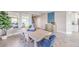 Open dining room with modern furnishings and an abundance of natural light at 1921 Lewis Bay Ave # Lot 21, North Las Vegas, NV 89084