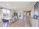 Inviting dining area featuring neutral tones, contemporary accents, and natural light at 1921 Lewis Bay Ave # Lot 21, North Las Vegas, NV 89084