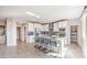 Spacious kitchen featuring white cabinets, a large island, and modern appliances at 1921 Lewis Bay Ave # Lot 21, North Las Vegas, NV 89084