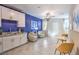 Inviting living room with a wet bar, plush seating, and natural light, perfect for relaxation at 1921 Lewis Bay Ave # Lot 21, North Las Vegas, NV 89084
