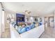 Spacious living room with a blue accent wall, modern furnishings, and ample lighting at 1921 Lewis Bay Ave # Lot 21, North Las Vegas, NV 89084