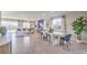 Bright open-concept living room with modern decor and large windows at 1921 Lewis Bay Ave # Lot 21, North Las Vegas, NV 89084