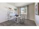 Bright office space with a sleek white desk, stylish decor, and a large window with natural light at 1921 Lewis Bay Ave # Lot 21, North Las Vegas, NV 89084