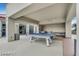 An outdoor game room features a pool table and comfortable lounge area at 200 W Sahara Ave # 2211, Las Vegas, NV 89102