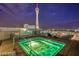Enjoy the city lights from this rooftop hot tub at night at 200 W Sahara Ave # 2211, Las Vegas, NV 89102