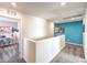 Upstairs hallway offering seamless access to each bedroom with neutral color palettes and plenty of light at 208 Biscotti Ave # Lot 124, North Las Vegas, NV 89084