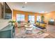 Bright kitchen featuring an island with seating, stainless appliances, and plenty of cabinet space at 208 Biscotti Ave # Lot 124, North Las Vegas, NV 89084
