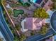 Aerial shot of the home showcasing the backyard putting green and mature landscaping at 2248 Carrizo Way, Henderson, NV 89052