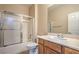 Bathroom featuring a shower and bath, toilet and vanity at 2248 Carrizo Way, Henderson, NV 89052