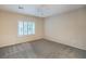 Neutral bedroom featuring a ceiling fan and large window offering natural light at 2248 Carrizo Way, Henderson, NV 89052