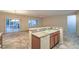 Open kitchen with white appliances, a large sink, and seamless access to dining and living areas at 2248 Carrizo Way, Henderson, NV 89052
