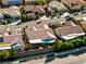 Charming single-story home with a covered patio, surrounded by mature landscaping at 2373 Black River Falls Dr, Henderson, NV 89044