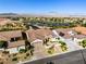 Well-maintained single-story home with mature landscaping and a three-car garage at 2373 Black River Falls Dr, Henderson, NV 89044