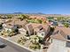Well-maintained single-story home featuring desert landscaping and mountain views at 2373 Black River Falls Dr, Henderson, NV 89044