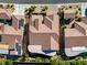 An aerial view of a single-Gathering home showcasing the roof, landscaping, and surrounding neighborhood at 2373 Black River Falls Dr, Henderson, NV 89044