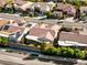 Charming single-story home featuring mature landscaping and a covered patio at 2373 Black River Falls Dr, Henderson, NV 89044