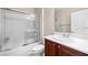 Bathroom with glass-enclosed shower, vanity, and sink at 2373 Black River Falls Dr, Henderson, NV 89044