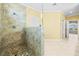 Spacious bathroom features a stone shower with glass partition and updated fixtures at 2373 Black River Falls Dr, Henderson, NV 89044