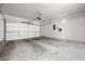 Spacious two-car garage with white door, ready for vehicles and storage at 2373 Black River Falls Dr, Henderson, NV 89044