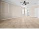 Open living room with tile flooring, neutral walls, and access to other rooms at 2373 Black River Falls Dr, Henderson, NV 89044