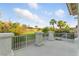 Scenic balcony view overlooking a lush golf course and mature trees, offering a tranquil and picturesque setting at 2445 Antler Point Dr, Henderson, NV 89074
