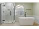 Bright bathroom featuring a modern tub and a separate glass shower at 2445 Antler Point Dr, Henderson, NV 89074