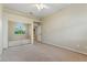 Bedroom with carpeted floors, ceiling fan, and sliding door closet at 2445 Antler Point Dr, Henderson, NV 89074