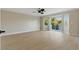 Open bedroom with new flooring and balcony access at 2445 Antler Point Dr, Henderson, NV 89074