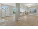 Spacious living room with large windows, high ceilings and bright neutral paint at 2445 Antler Point Dr, Henderson, NV 89074