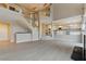Open living room with stairs leading up to the second floor at 2445 Antler Point Dr, Henderson, NV 89074