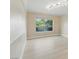 Bright, airy living room with neutral walls, wall-to-wall carpeting, and recessed lighting at 2445 Antler Point Dr, Henderson, NV 89074