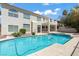 Stunning pool with a backyard view of the home's architecture, seamlessly blending indoor and outdoor living at 2445 Antler Point Dr, Henderson, NV 89074