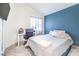 Bedroom featuring neutral wall colors, natural lighting, and a desk for working from home at 2744 Ironside Dr, Las Vegas, NV 89108