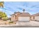 Charming single-story home featuring a 2-car garage and a well-maintained front yard landscape at 2744 Ironside Dr, Las Vegas, NV 89108
