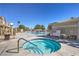 Inviting community hot tub with clear blue water, surrounded by landscaping and leisure areas at 2744 Ironside Dr, Las Vegas, NV 89108