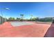Well-maintained outdoor tennis court with green fencing, ready for friendly matches and exercise at 2744 Ironside Dr, Las Vegas, NV 89108