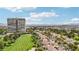 Wide aerial view showing homes alongside a lush golf course, with the modern Las Vegas skyline as a backdrop at 3177 Bel Air Dr, Las Vegas, NV 89109